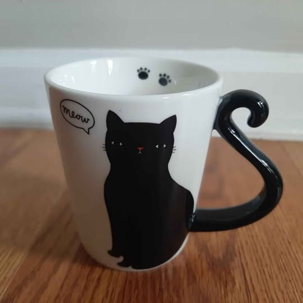 Chasing Lola "meow" coffee mug